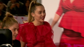 Miley Cyrus Reps for Hubby Liam Hemsworth and Valentino at Isn t It Romantic L.A. Premiere
